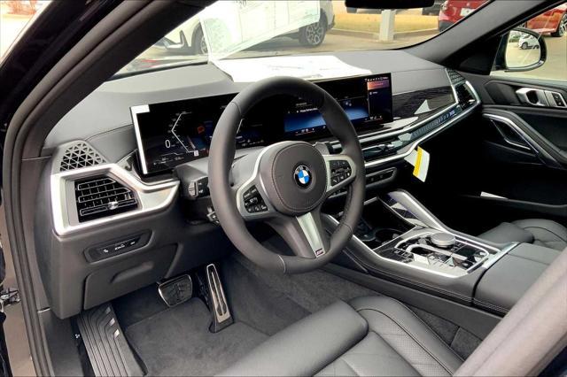 new 2025 BMW X6 car, priced at $77,875