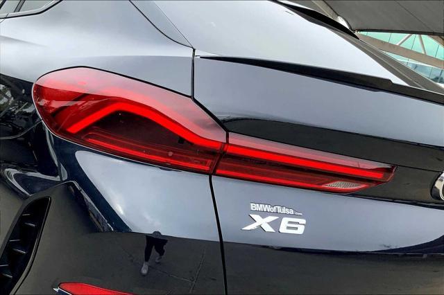 new 2025 BMW X6 car, priced at $77,875