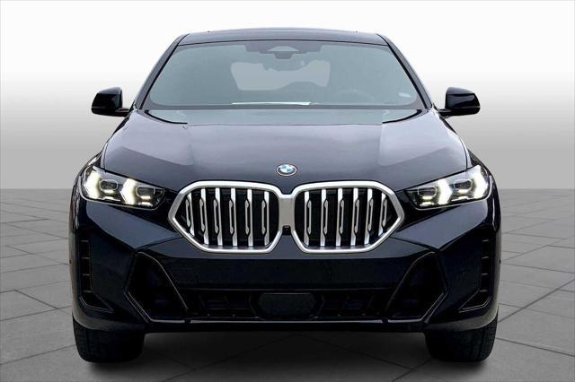 new 2025 BMW X6 car, priced at $77,875