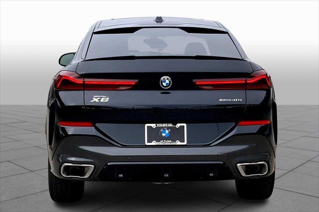 new 2025 BMW X6 car, priced at $77,875