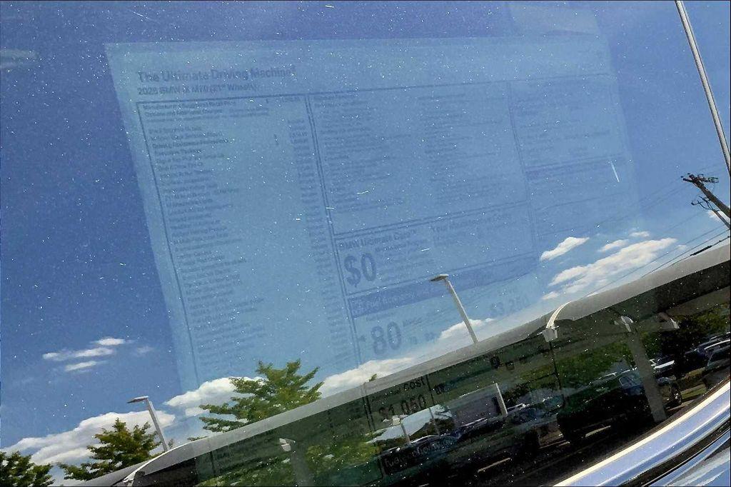 new 2026 BMW iX car, priced at $116,970