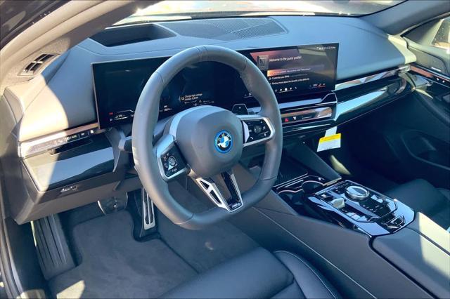 new 2025 BMW 550e car, priced at $82,305