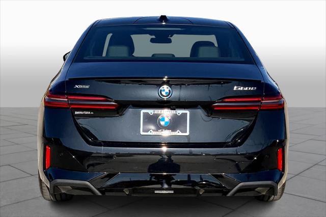 new 2025 BMW 550e car, priced at $82,305