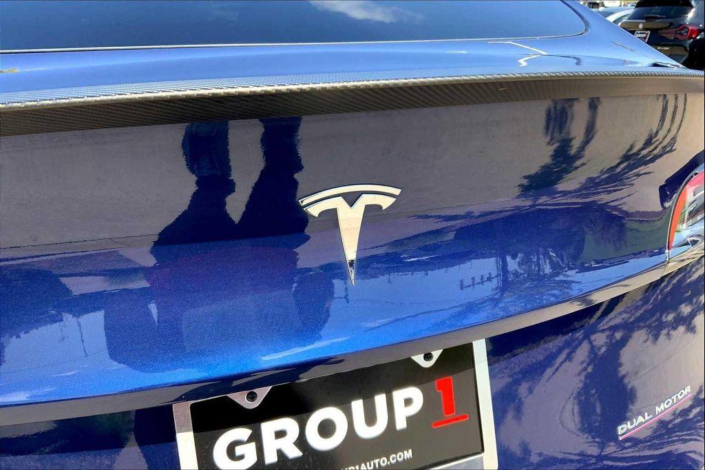 used 2024 Tesla Model Y car, priced at $35,990