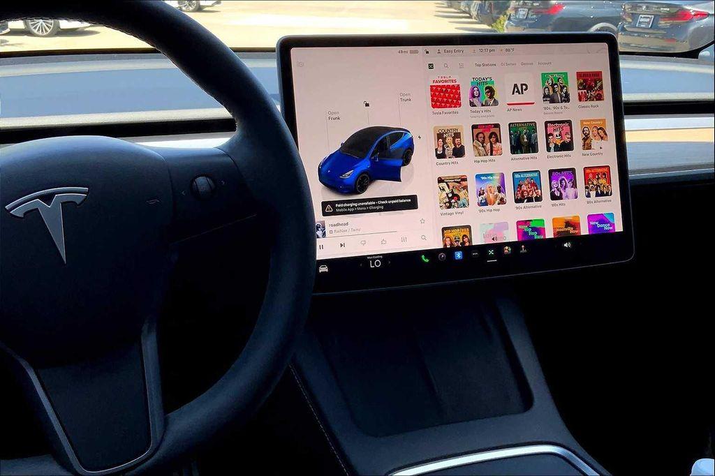 used 2024 Tesla Model Y car, priced at $35,990