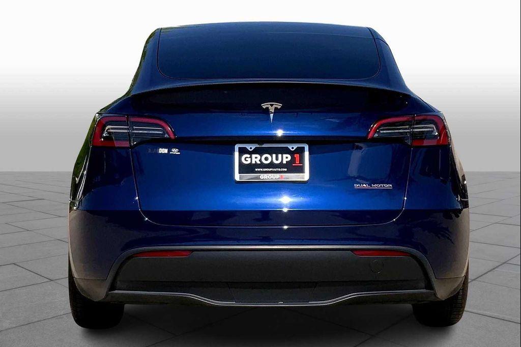 used 2024 Tesla Model Y car, priced at $35,990