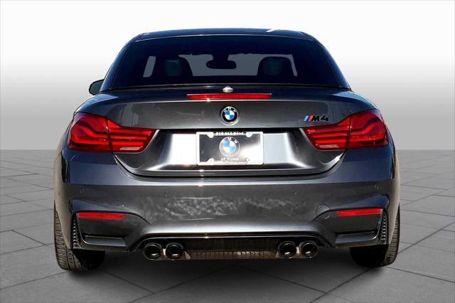 used 2018 BMW M4 car, priced at $42,500