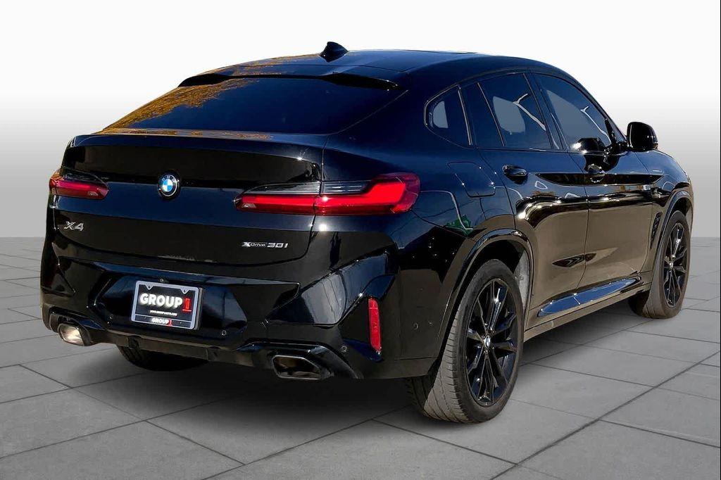 used 2025 BMW X4 car, priced at $52,990