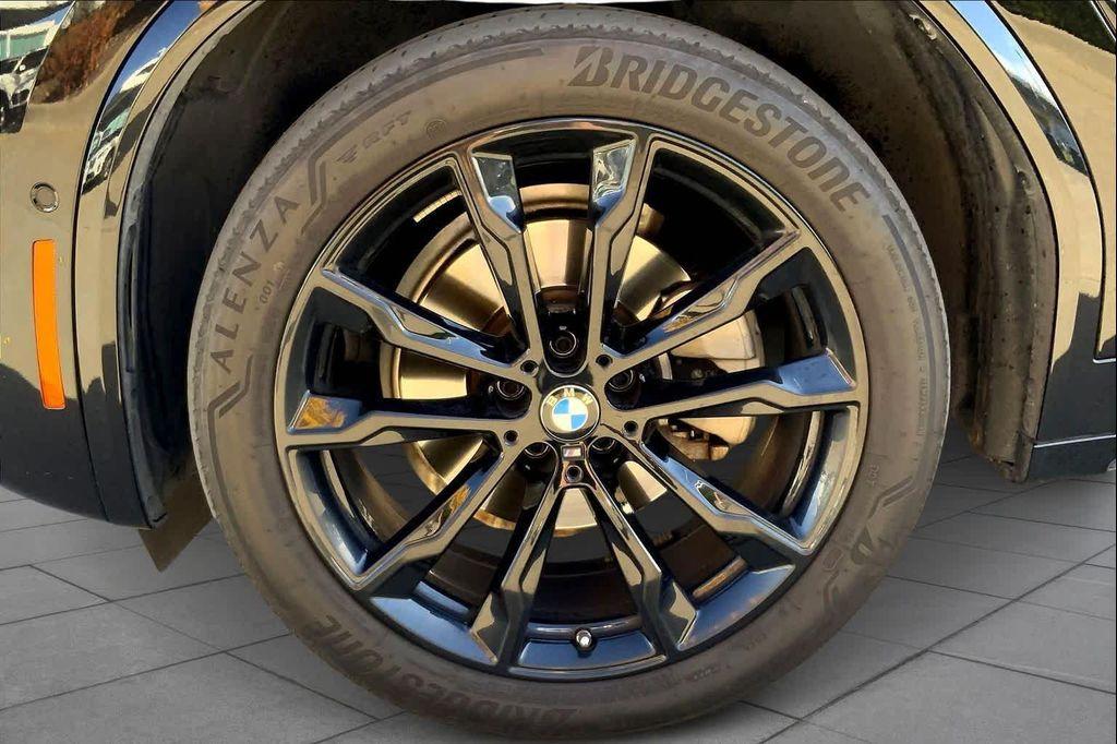 used 2025 BMW X4 car, priced at $52,990