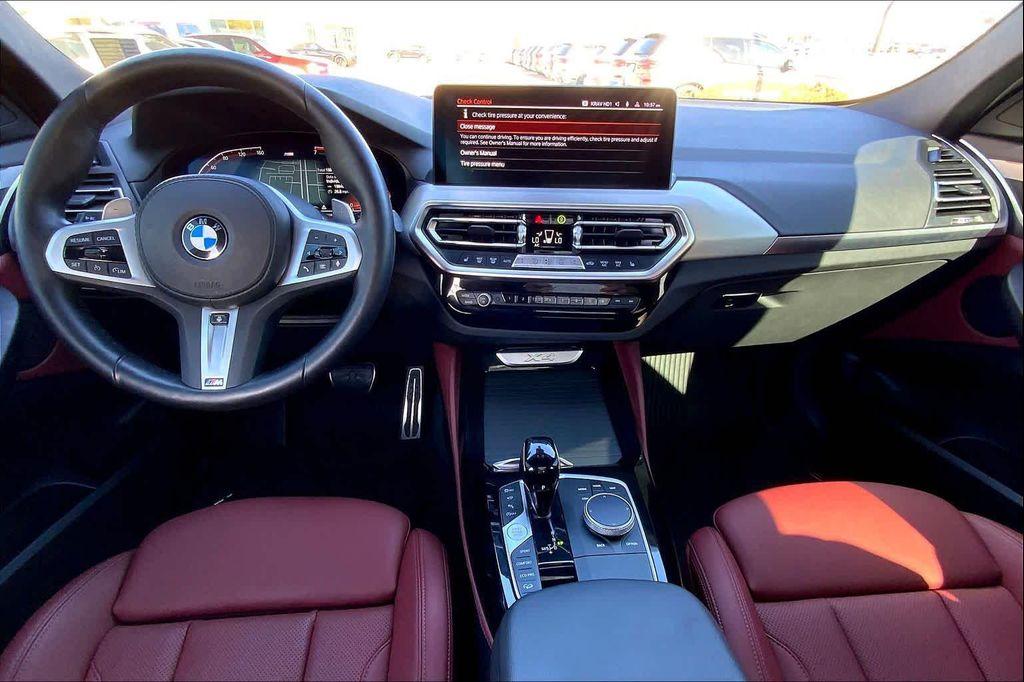 used 2025 BMW X4 car, priced at $52,990