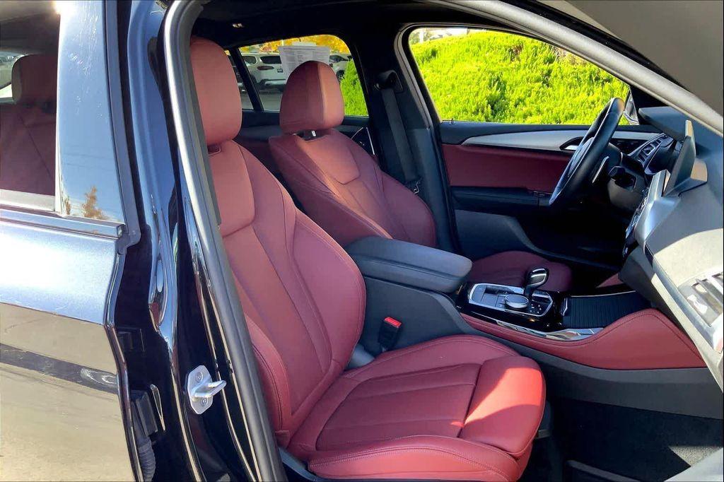 used 2025 BMW X4 car, priced at $52,990