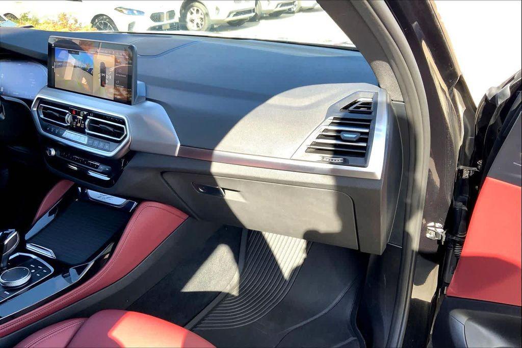 used 2025 BMW X4 car, priced at $52,990
