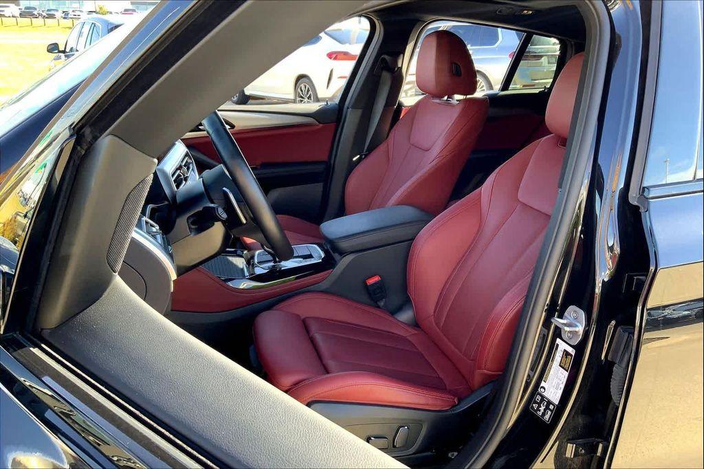 used 2025 BMW X4 car, priced at $52,990