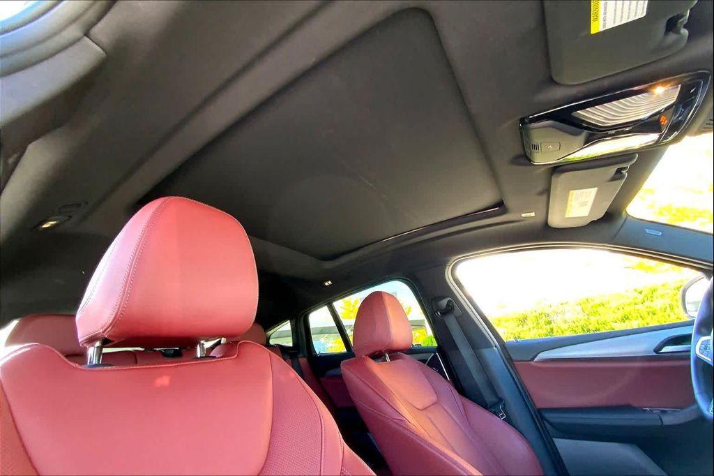 used 2025 BMW X4 car, priced at $52,990