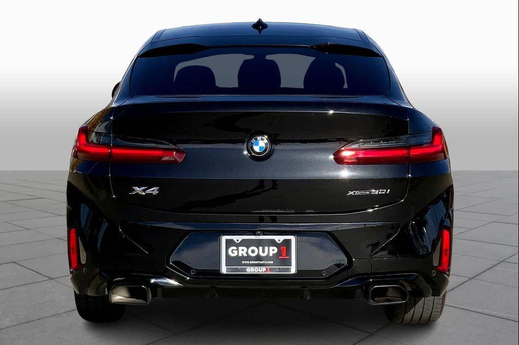 used 2025 BMW X4 car, priced at $52,990
