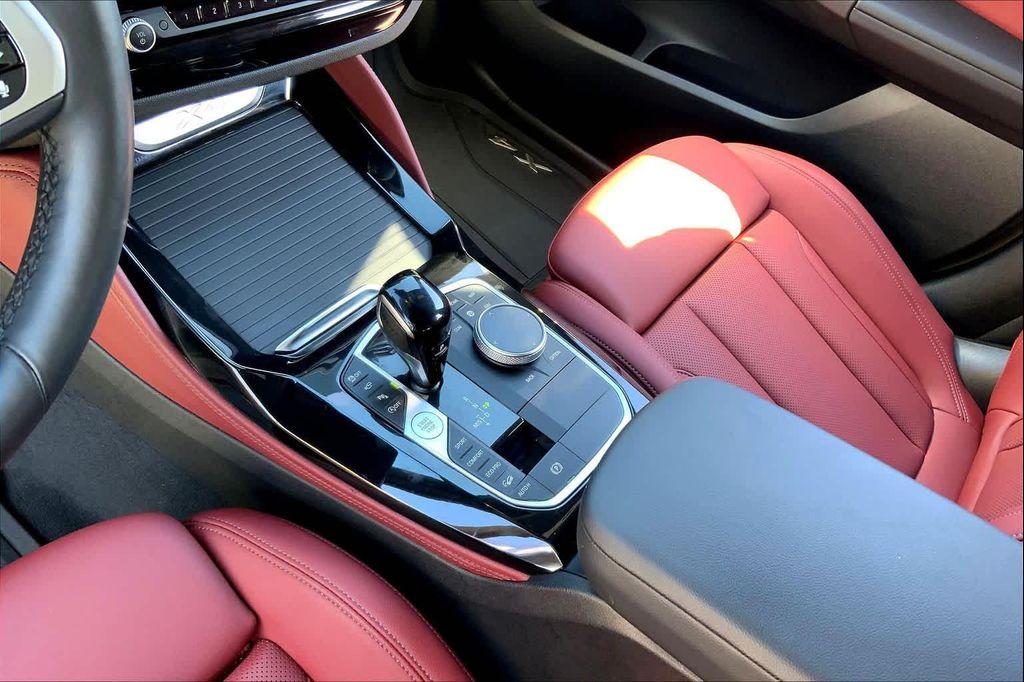 used 2025 BMW X4 car, priced at $52,990