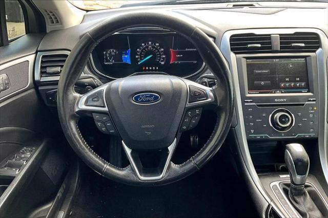 used 2014 Ford Fusion car, priced at $10,798