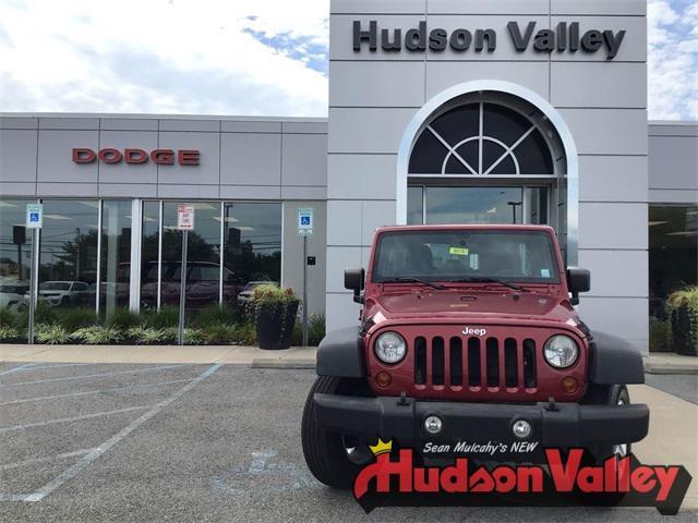 used 2013 Jeep Wrangler Unlimited car, priced at $15,498