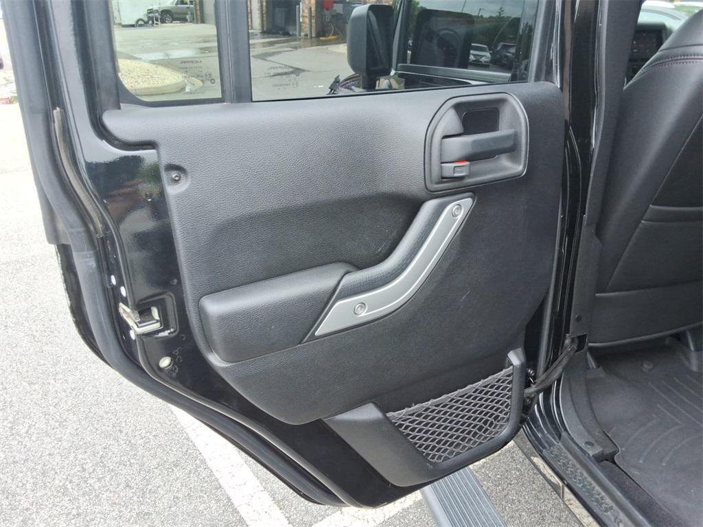 used 2014 Jeep Wrangler Unlimited car, priced at $27,344