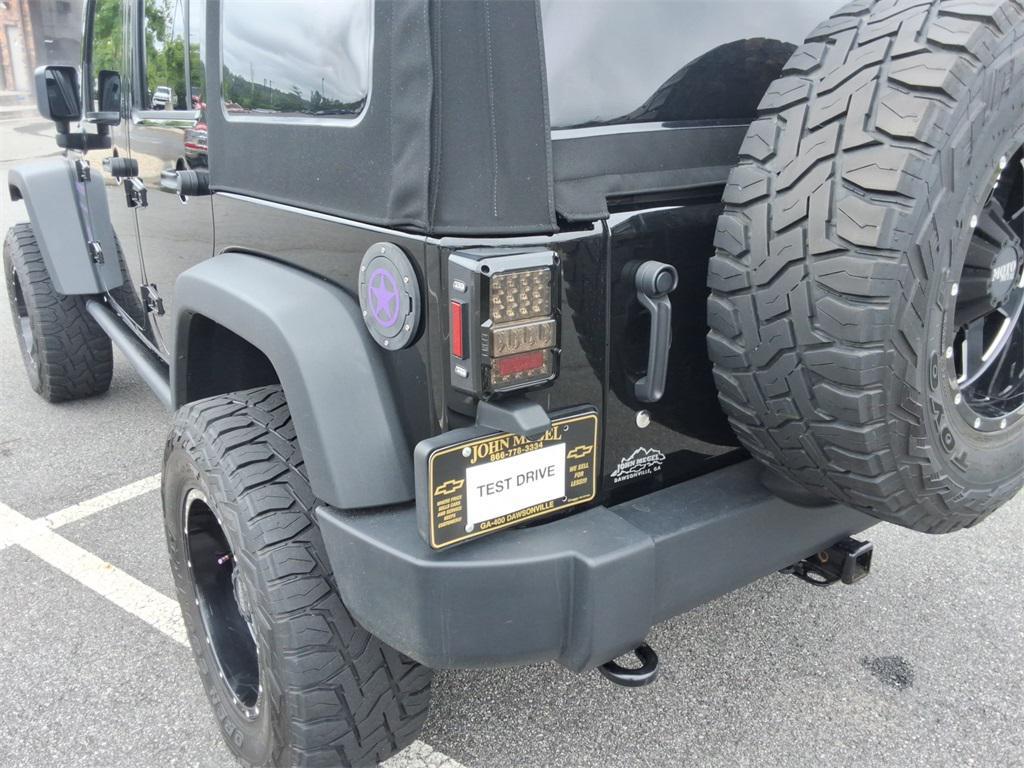 used 2014 Jeep Wrangler Unlimited car, priced at $27,344