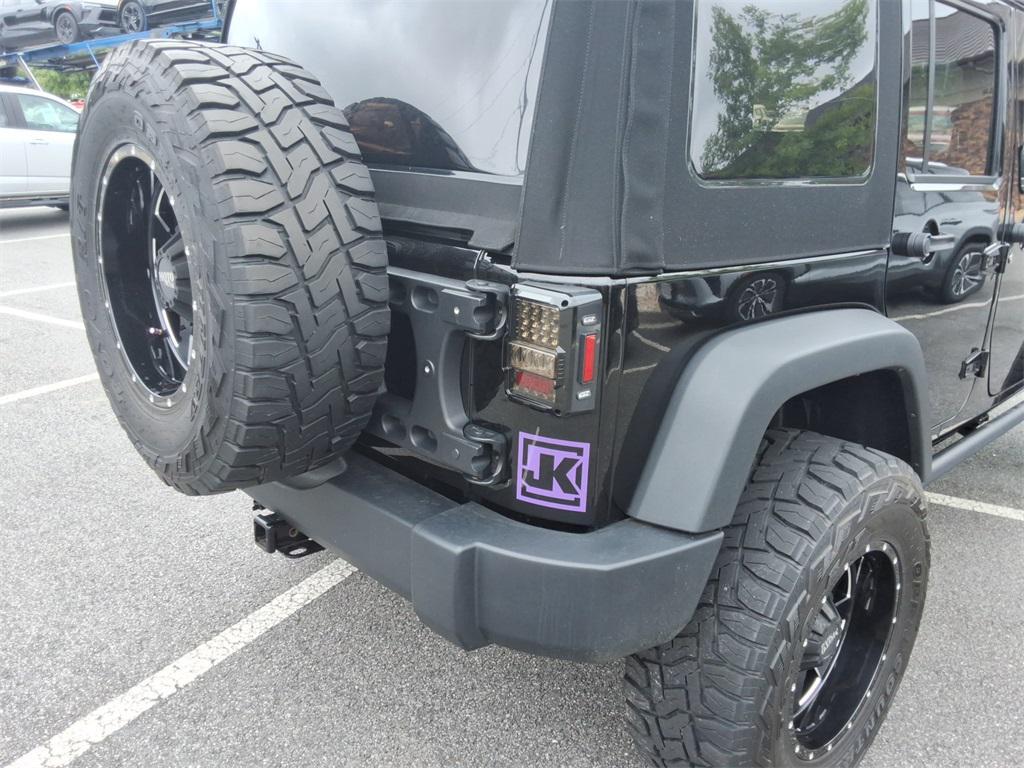 used 2014 Jeep Wrangler Unlimited car, priced at $27,344