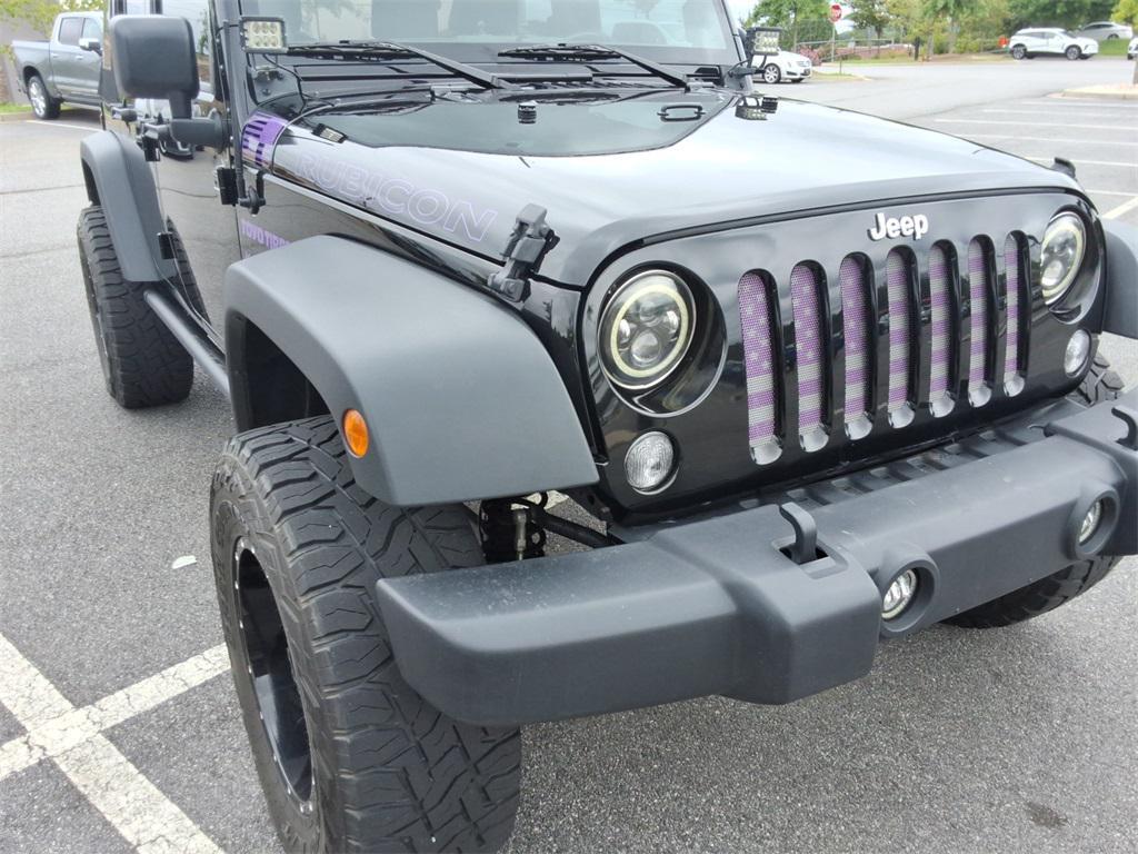used 2014 Jeep Wrangler Unlimited car, priced at $27,344