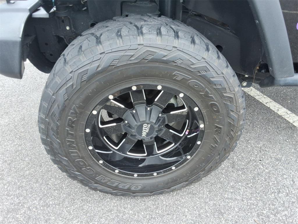 used 2014 Jeep Wrangler Unlimited car, priced at $27,344