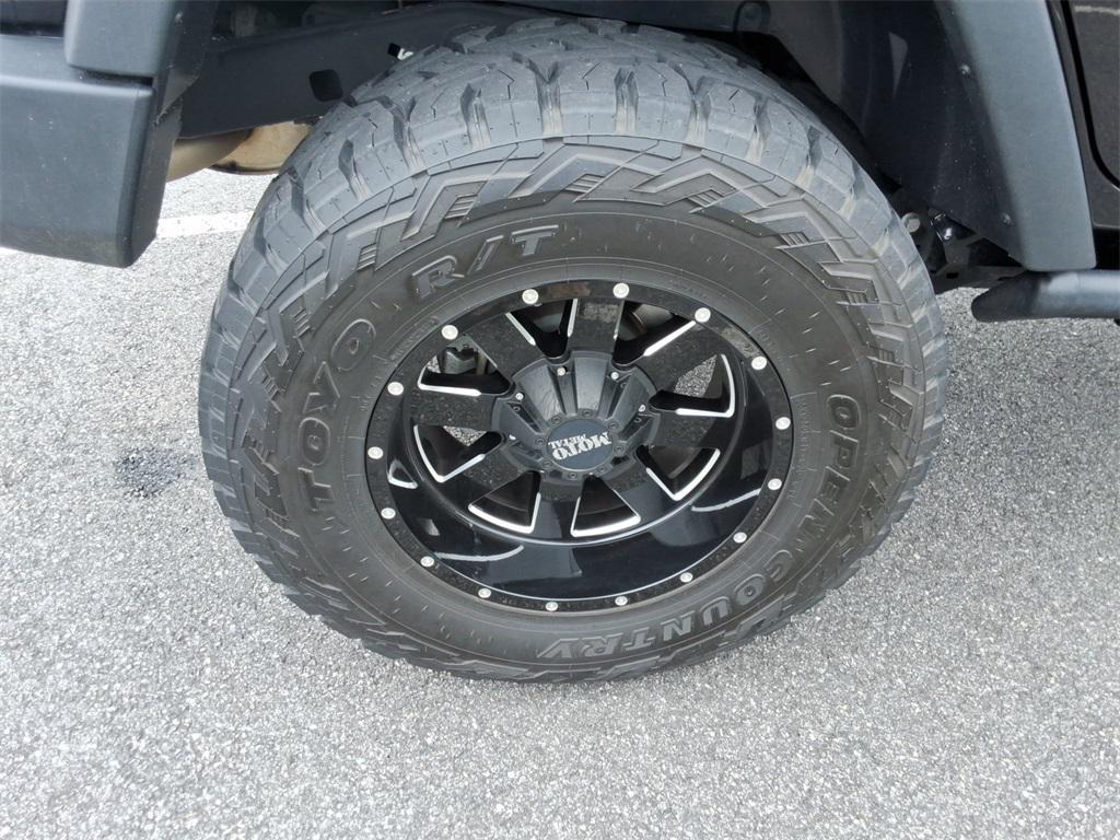 used 2014 Jeep Wrangler Unlimited car, priced at $27,344