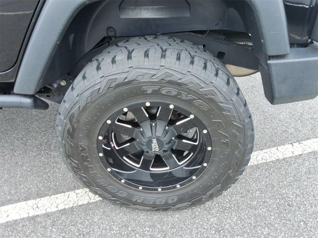 used 2014 Jeep Wrangler Unlimited car, priced at $27,344