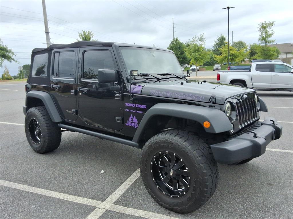 used 2014 Jeep Wrangler Unlimited car, priced at $27,344