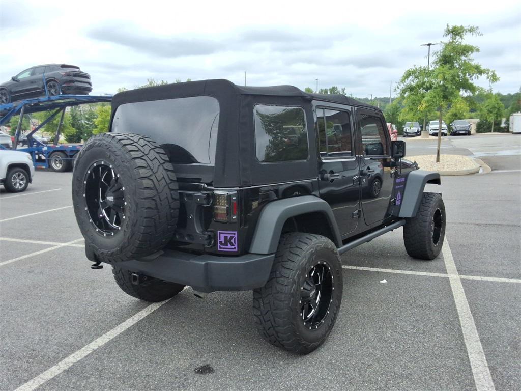 used 2014 Jeep Wrangler Unlimited car, priced at $27,344
