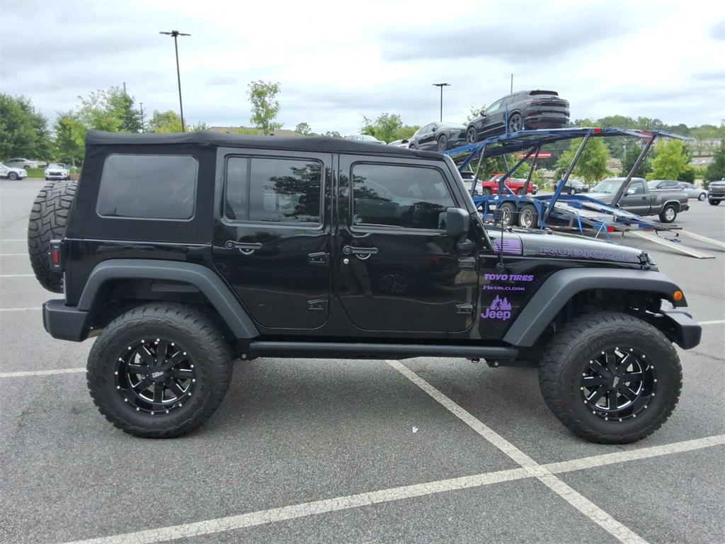 used 2014 Jeep Wrangler Unlimited car, priced at $27,344