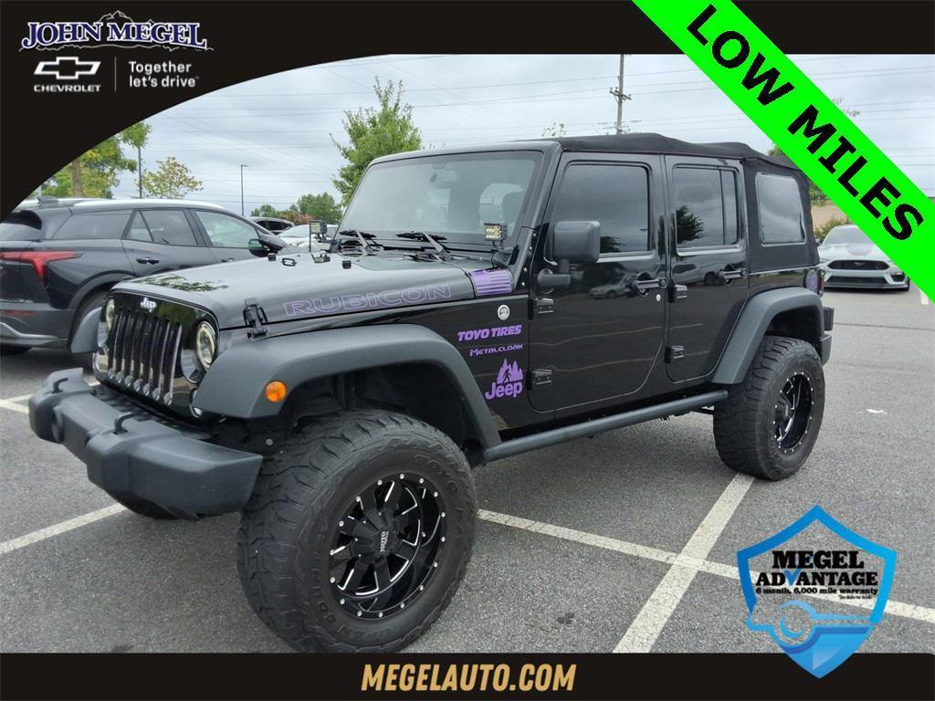 used 2014 Jeep Wrangler Unlimited car, priced at $27,344