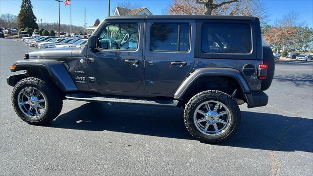 used 2021 Jeep Wrangler Unlimited car, priced at $38,876