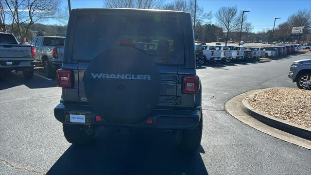 used 2021 Jeep Wrangler Unlimited car, priced at $38,876