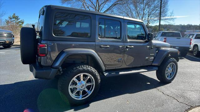 used 2021 Jeep Wrangler Unlimited car, priced at $38,876