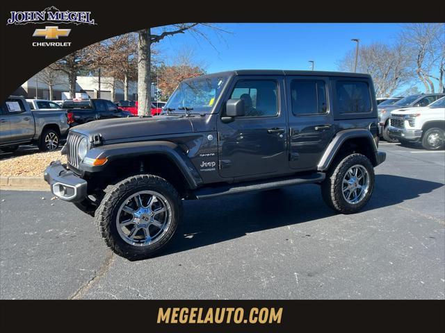 used 2021 Jeep Wrangler Unlimited car, priced at $38,876