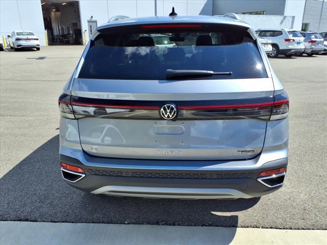 used 2025 Volkswagen Taos car, priced at $31,721