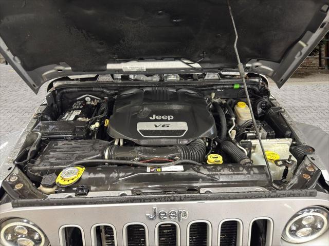 used 2016 Jeep Wrangler Unlimited car, priced at $16,991
