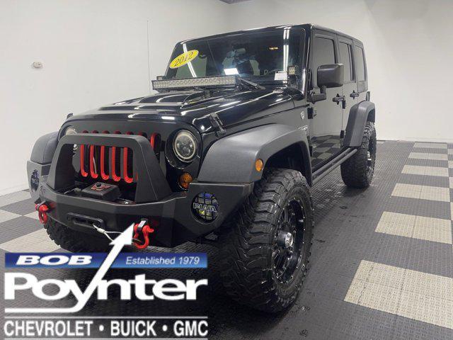 used 2012 Jeep Wrangler Unlimited car, priced at $24,444