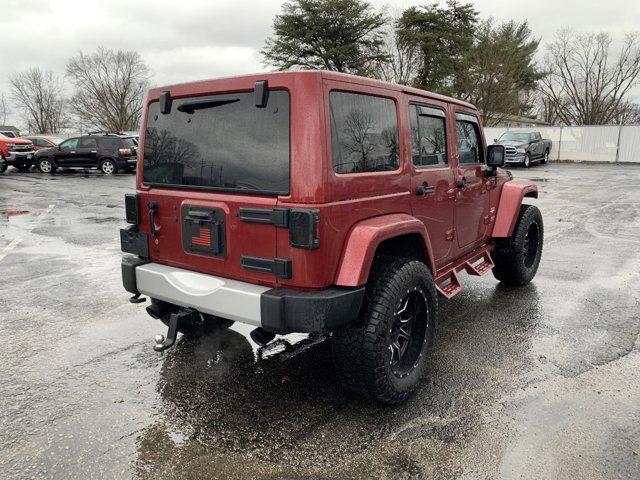 used 2011 Jeep Wrangler Unlimited car, priced at $14,444