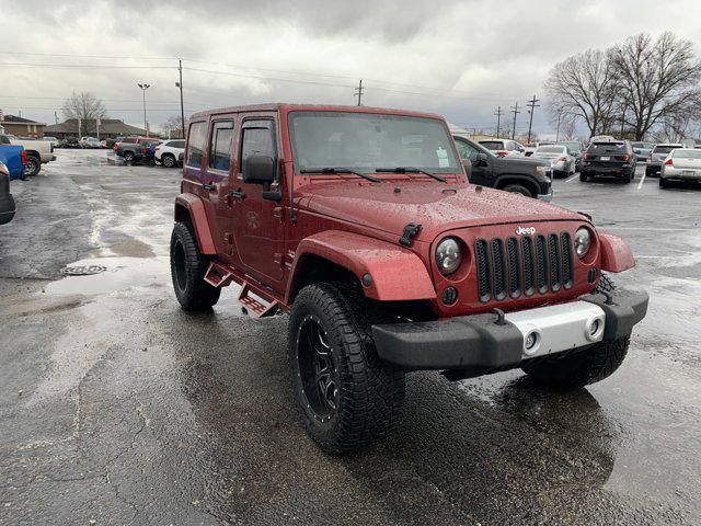 used 2011 Jeep Wrangler Unlimited car, priced at $14,444