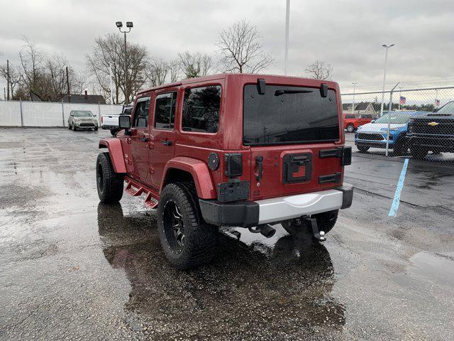 used 2011 Jeep Wrangler Unlimited car, priced at $14,444