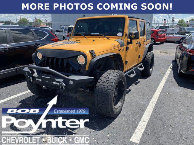 used 2013 Jeep Wrangler Unlimited car, priced at $18,888