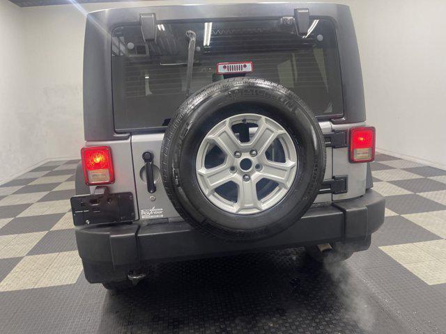 used 2013 Jeep Wrangler Unlimited car, priced at $9,777