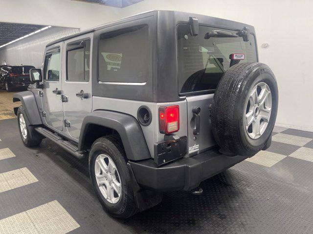 used 2013 Jeep Wrangler Unlimited car, priced at $9,777