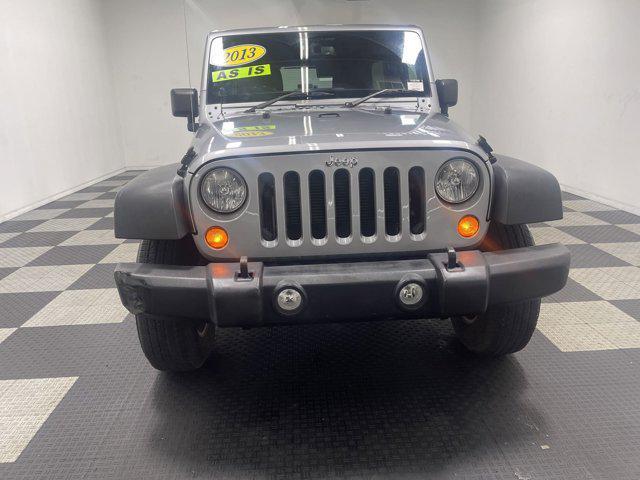 used 2013 Jeep Wrangler Unlimited car, priced at $9,777