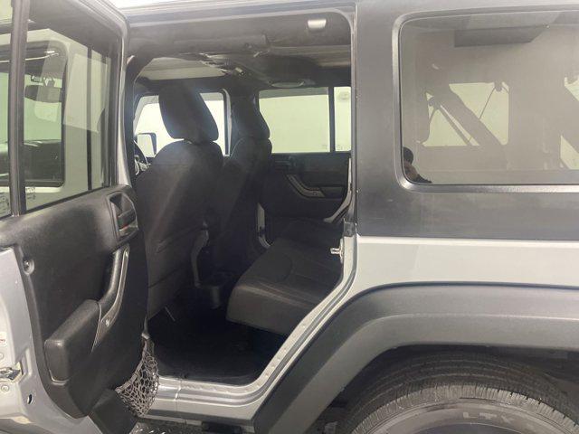 used 2013 Jeep Wrangler Unlimited car, priced at $9,777