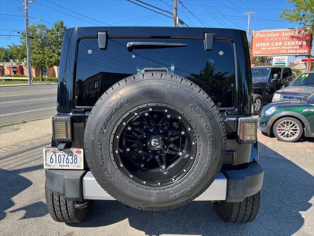 used 2014 Jeep Wrangler Unlimited car, priced at $22,875