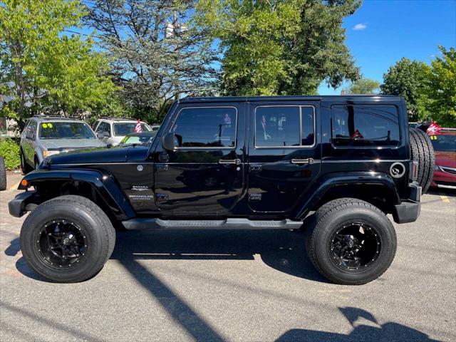 used 2014 Jeep Wrangler Unlimited car, priced at $22,875